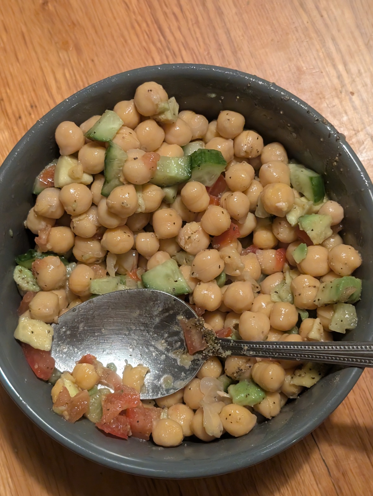 Dhruv’s everyday dinner, chickpeas with tomato and cucumber